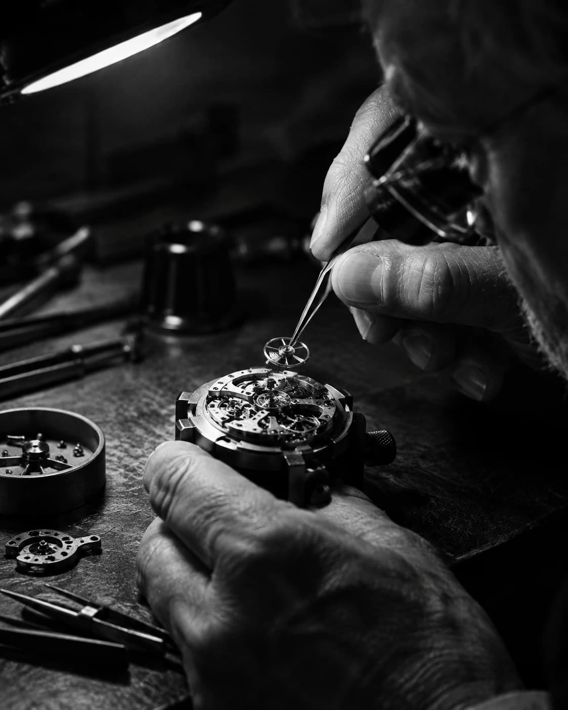 Master Swiss watchmaker assembling tourbillon escapement